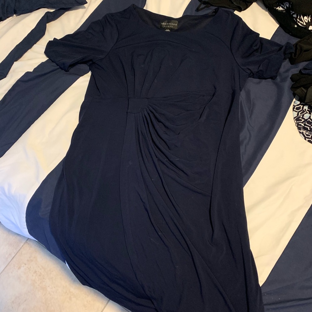 Navy dress with swirl design in the middle